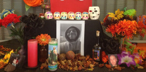COMMEMORATION: The Puente Club placed a photo of deceased member Emmanuel Ruiz on a Dia de Los Muertos altar. PHOTO BY KARINA RAMIREZ