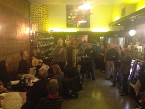LAUNCH PARTY: Professor Paula Sheil speaks to a crowd at Launch event. COURTESY PHOTO