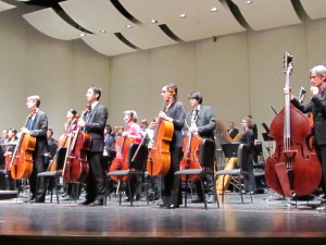 IMPRESSIVE PERFORMANCE: Top, the Stockton Symphony stood as the audience applauded. Right, an image of the flier that was advertis- ing Tracy Silverman's Facebook page and email adddress.