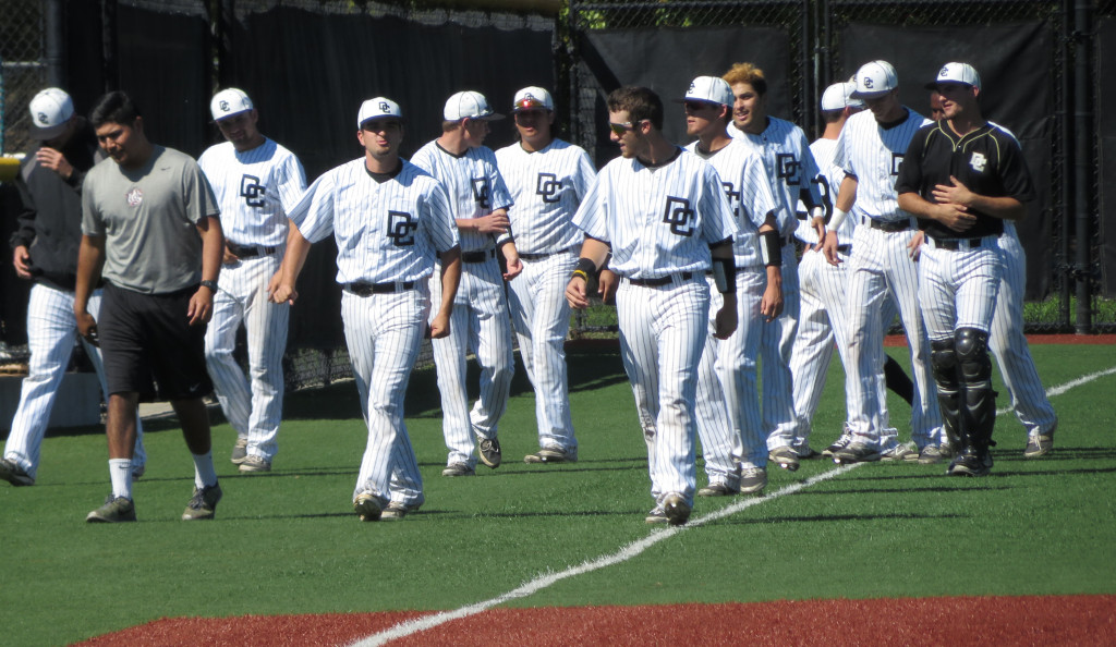 ON THE FIELD: The Delta Mustangs finishing warm-ups before the game against Santa Rosa on March 14. PHOTO BY JERMAINE DAVIS