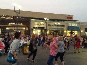 CLOSE TO DELTA COLLEGE: A group of people are dancing around Stonecreek Village. PHOTO BY ELEANOR MAFI