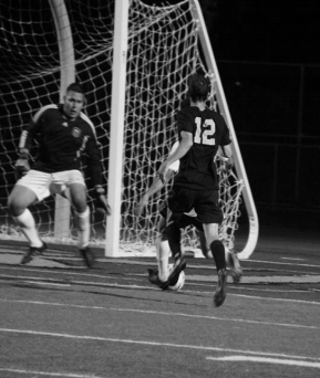 NO ENTRY: Mustang goalkeeper Moses Hernandez  prepares to make a stop against American River. PHOTO BY PETER PEANG
