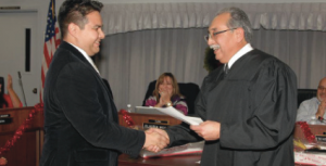 SWEARING IN: Richard Vasquez is sworn in to the Area 4 Board of Trustees seat on Dec. 9. PHOTO COURTESY OF JIM VERGARA